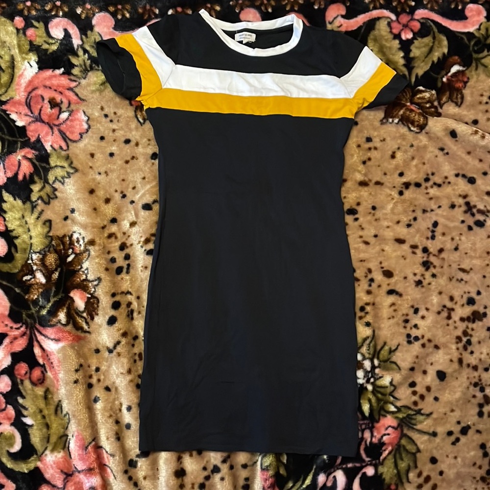 Black dress with white and yellow stripes